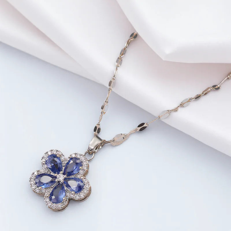 Earrings and Necklace with Cherry Blossom Pendant and Blue Zirconia Stone