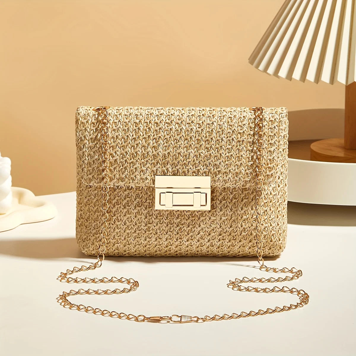 Modern Crossbody Bag with Lock Closure in Hand-Woven Straw