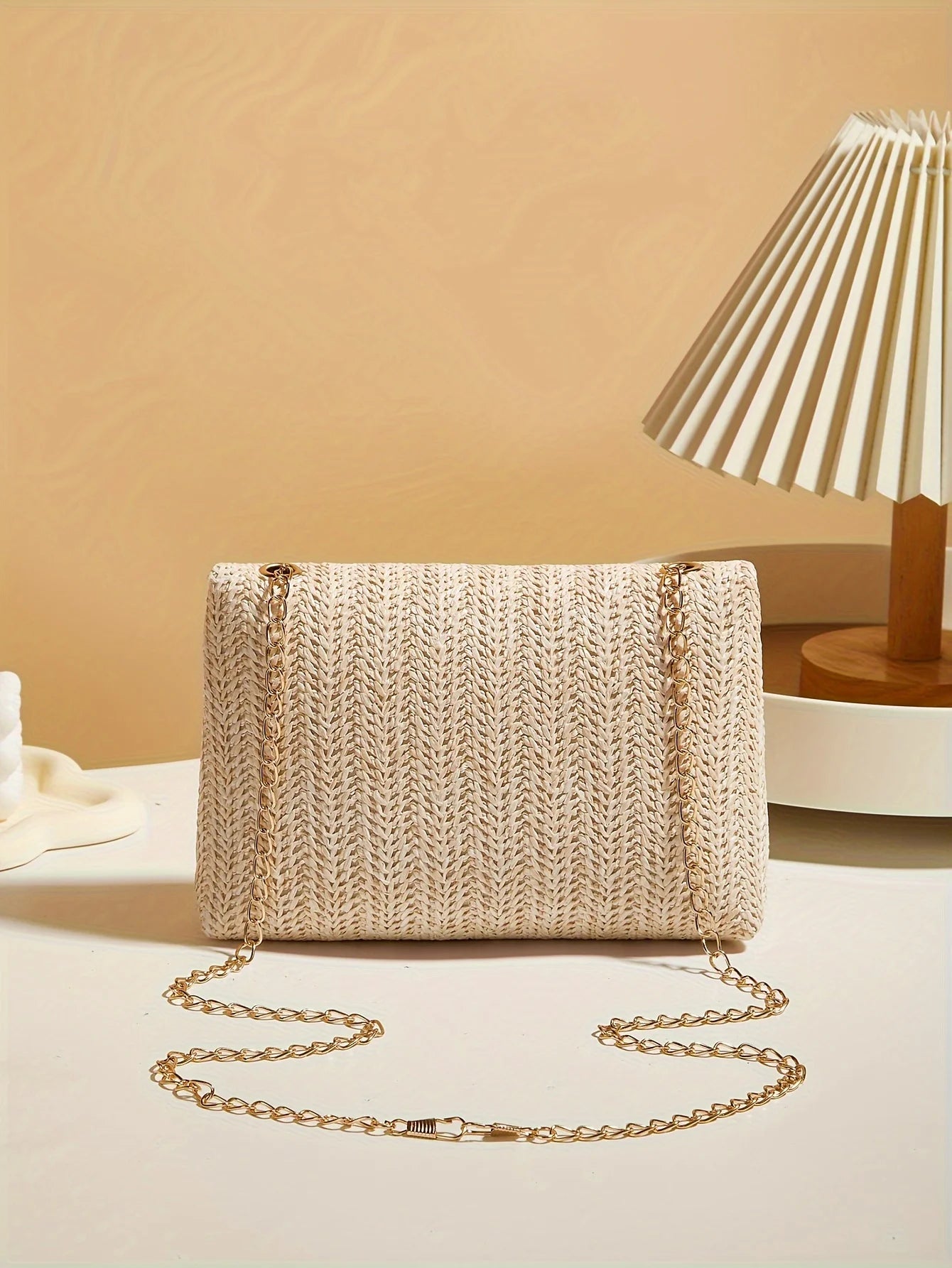 Modern Crossbody Bag with Lock Closure in Hand-Woven Straw